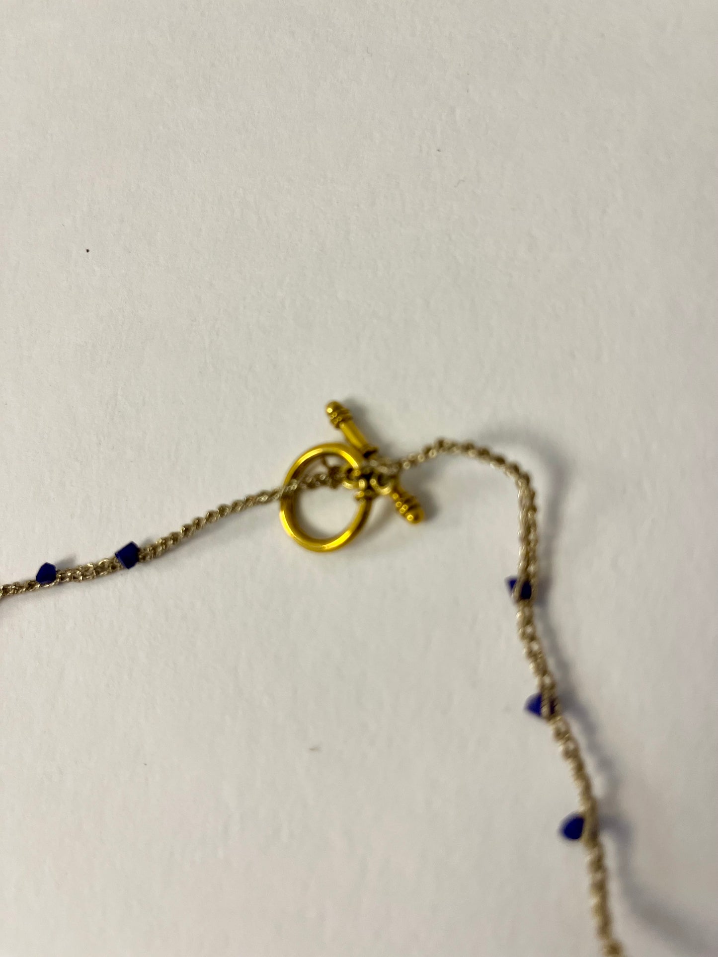 collana talismano contro l'aggressività in ceramica