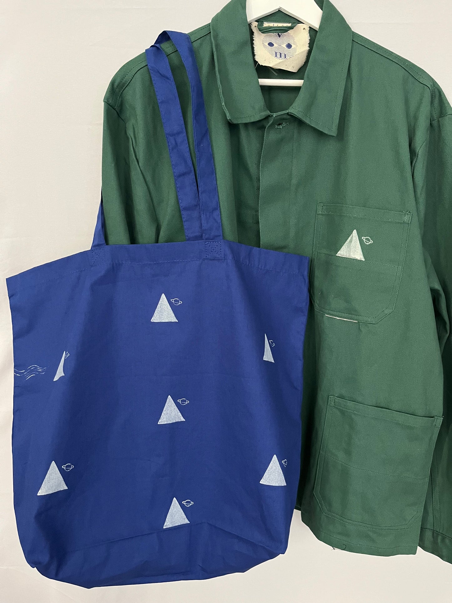 borse maxi in cotone terracotta serigrafata con coccodrillo e triangoli