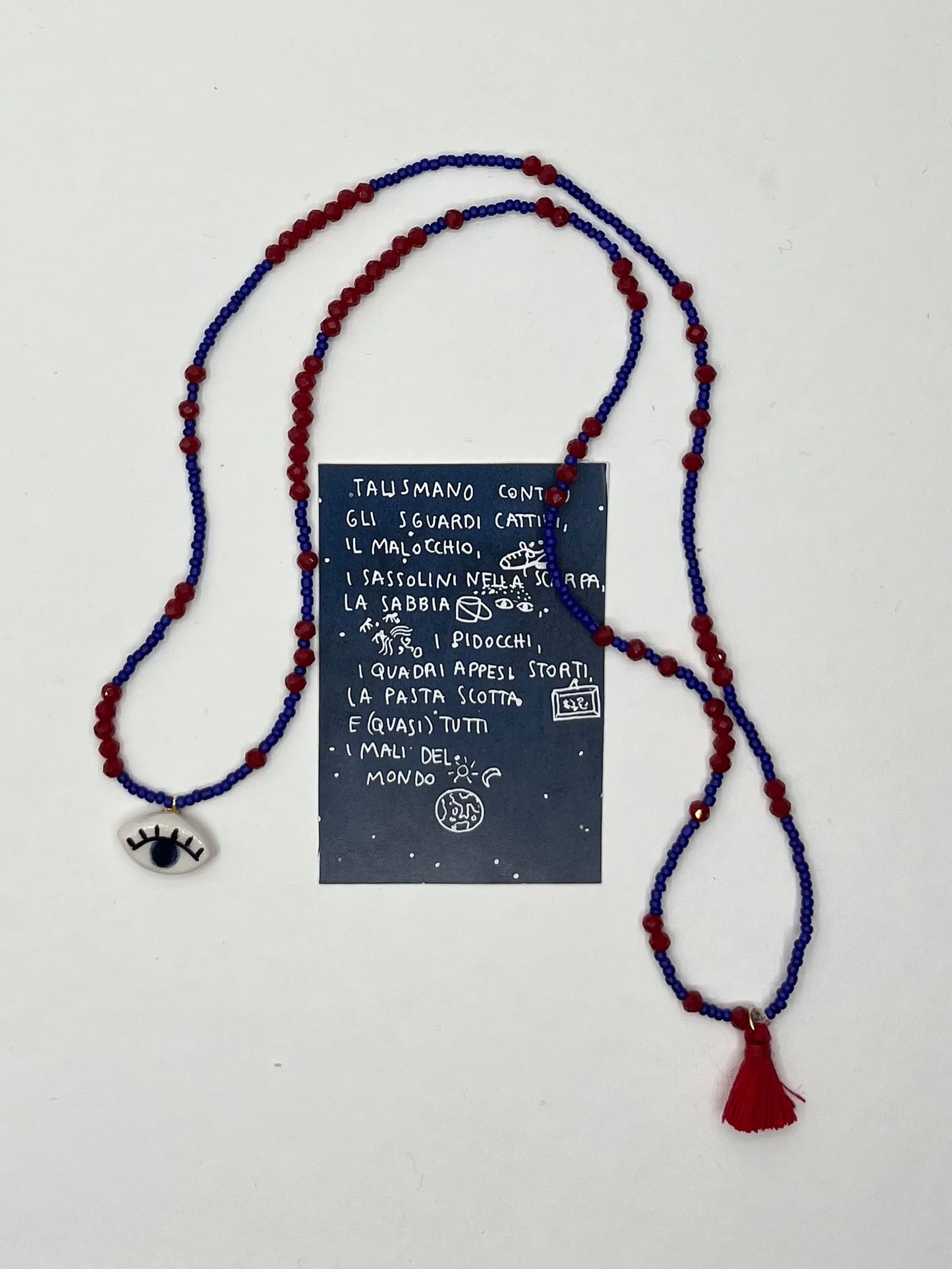 collana talisMANO con ciondolo a forma di occhio o mano e perline colorate