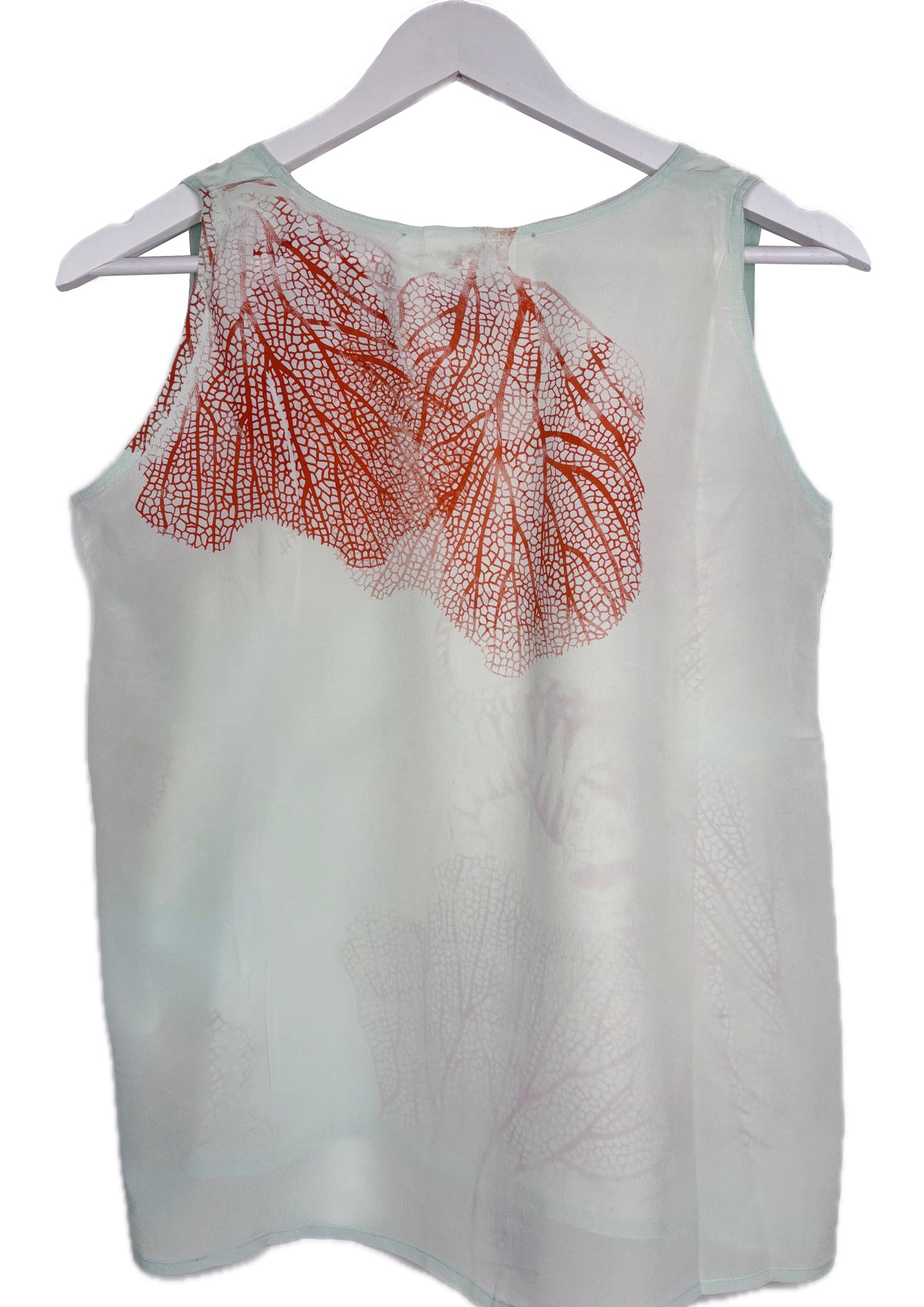 Canotta in seta verde acqua con serigrafie arancio