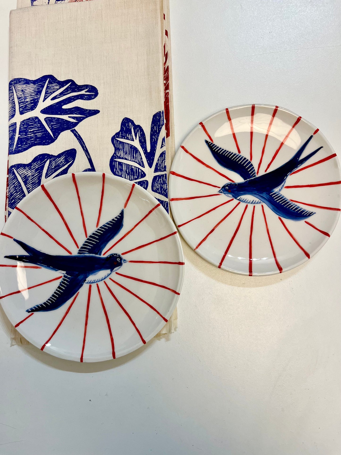 Piattini in ceramica rondini blu