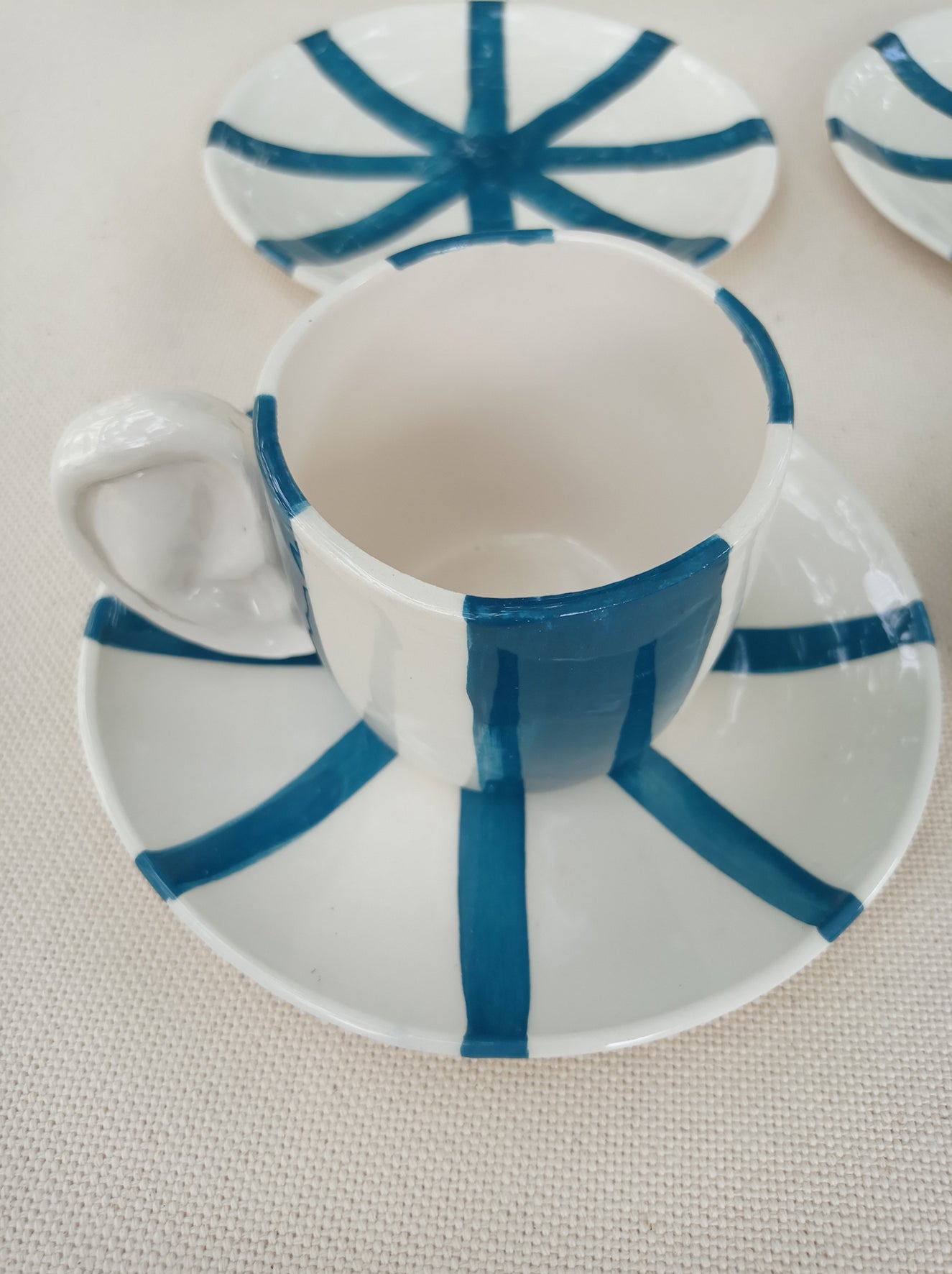 Tazza da tè con maniglia a forma di orecchio