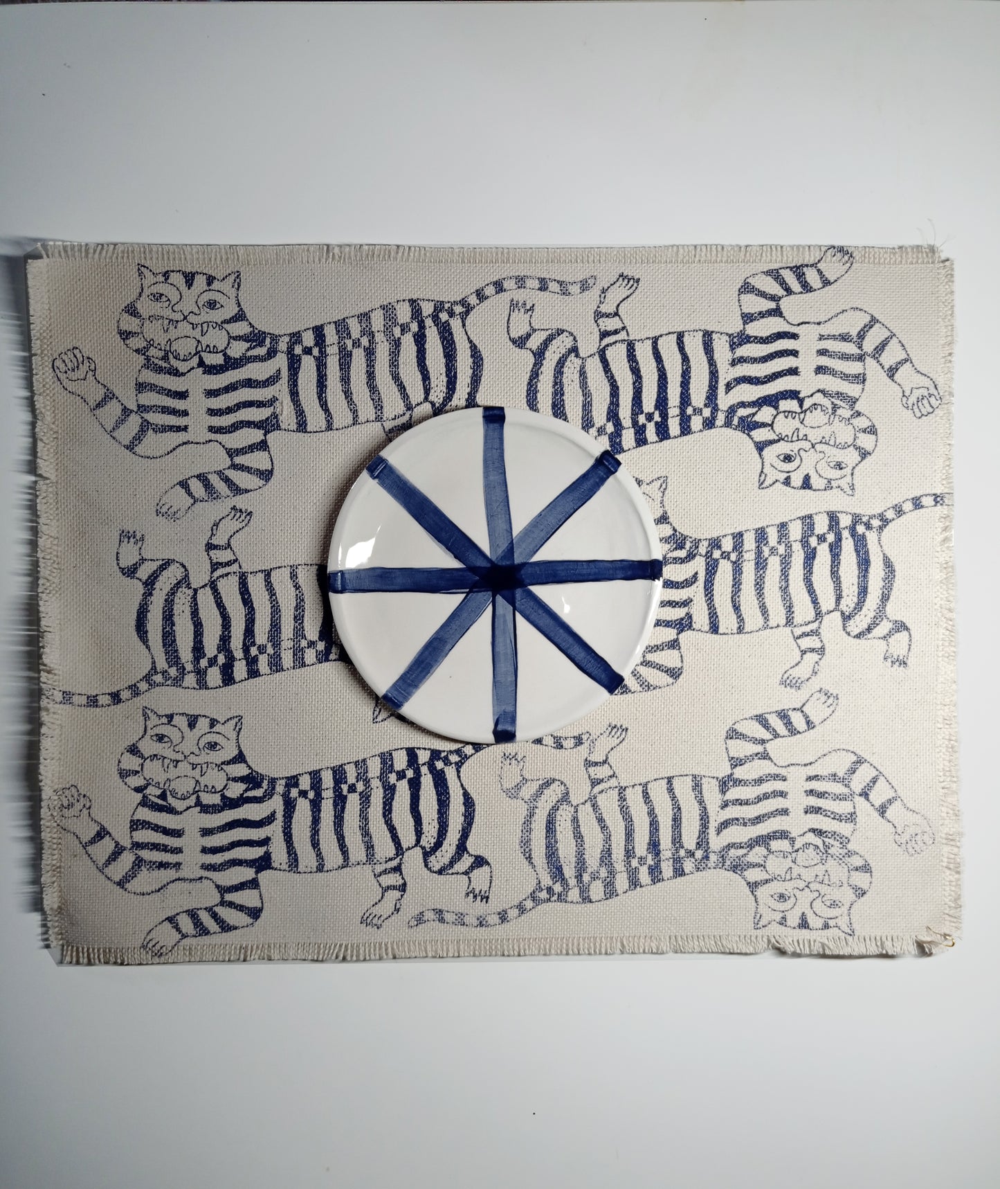 coppia di tovagliette americane in cotone spesso con frange e serigrafie