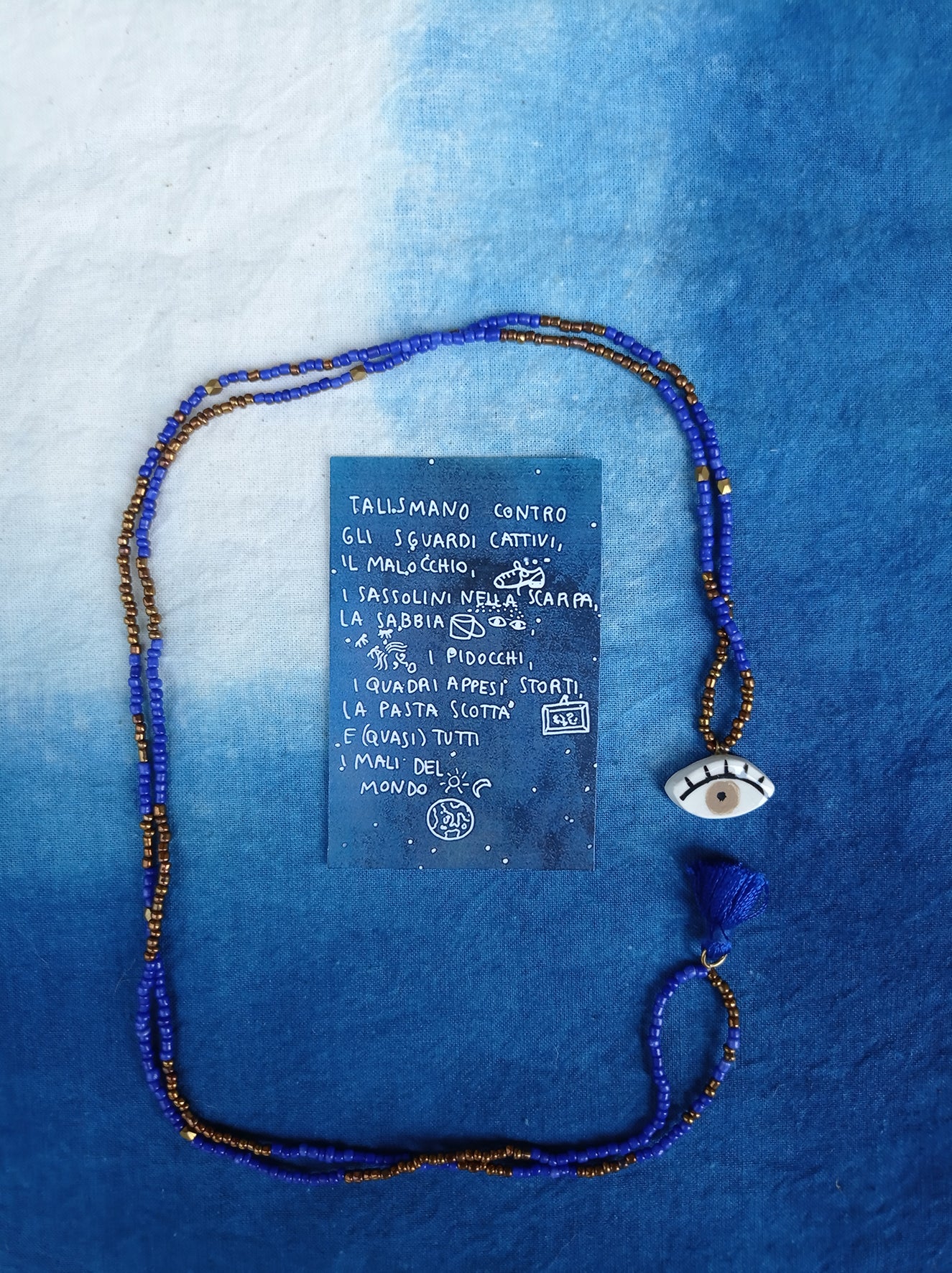 collana talisMANO con ciondolo a forma di occhio o mano e perline colorate o pietre semipreziose